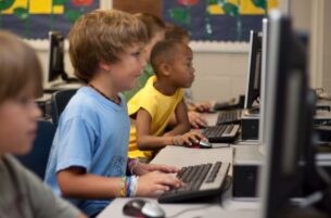 Young students on computers